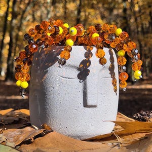 Autumn Beaded Plant with Face Pot, Handmade Orange Yellow Brown Bead Sculpture, Concrete Face Planter, Whimsical Fall Decor