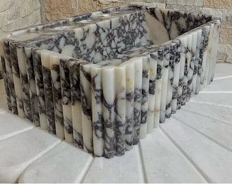 lavabo de mármol calacatta violeta