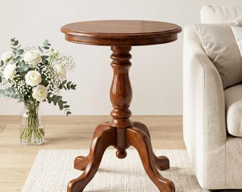 Mesa auxiliar redonda clásica de madera maciza hecha a mano con pedestal y base torneada.