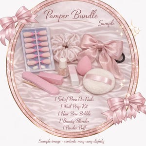 May include: A pink "Pamper Bundle" with press-on nails, a nail prep kit, a hair bow bobble, a beauty blender, and a powder puff. The items are arranged on a pink satin surface, with a decorative pink bow and the text "Sample".
