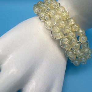 Handcrafted Clear Crackle Glass Multi-Row Statement Bracelet with Silver Accents.