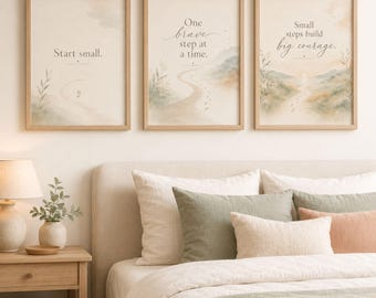 May include: Three framed wall art prints with light wood frames. The first print says Start small. The second print says One brave step at a time. The third print says Small steps build big courage. Each print features a watercolor landscape.