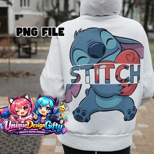 May include: White hoodie featuring a blue cartoon character holding a red heart with the word "STITCH" in white. The hoodie also has the text "PNG FILE" in black. A colorful logo with anime characters is visible.