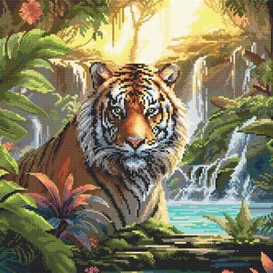 May include: A detailed cross-stitch pattern featuring a tiger centered in a lush jungle environment. The scene includes vibrant green tropical foliage, a cascading waterfall in the background, and a clear blue pool of water at the base of the tiger.