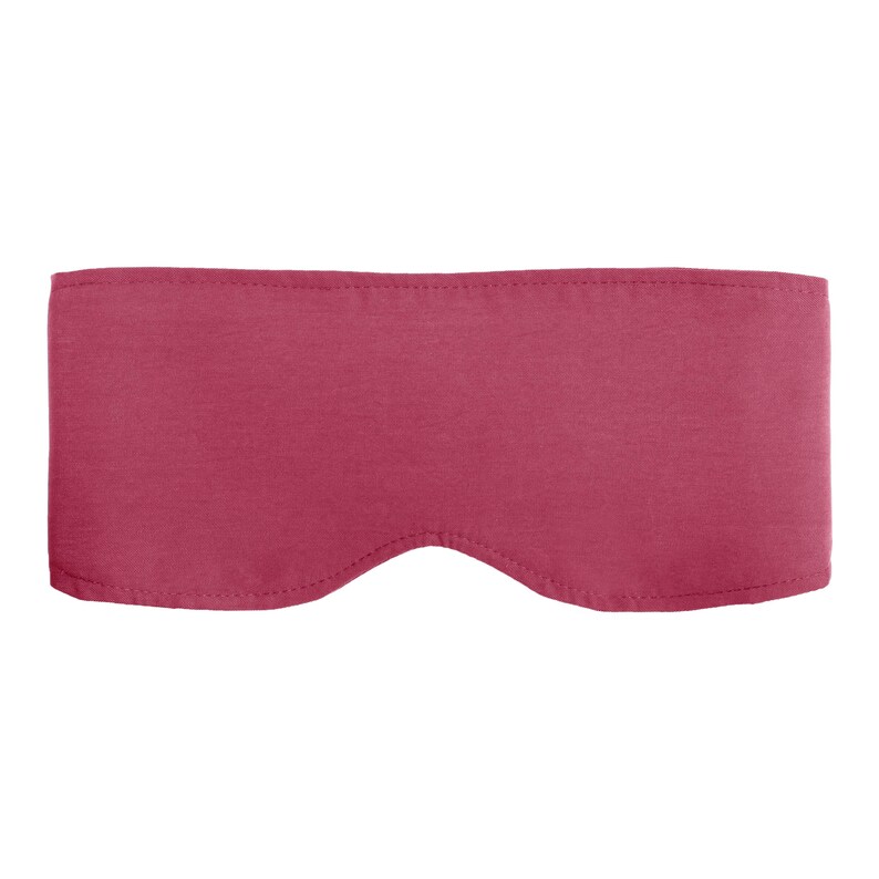 May include: A solid burgundy sleep mask. The mask is rectangular with a curved cutout for the nose and stitched edges. The fabric appears soft and opaque, designed to block out light.