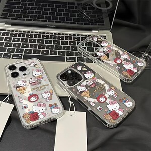 May include: Clear phone cases with a Hello Kitty design. The cases feature illustrations of Hello Kitty with desserts, apples, and the text "Mint Queen Kitty" and "Ice CR".
