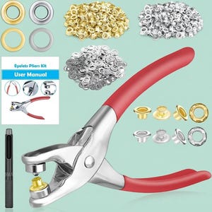 May include: An eyelet pliers kit featuring a silver metal tool with red rubberized handles, a black hole punch tool, and a user manual. The set includes numerous gold and silver metal eyelets and washers arranged in piles and rows.