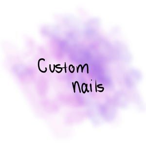 May include: The words "Custom nails" in black script are centered on a soft, blurred purple and white background. The image is a simple design, likely for a nail art business or service.