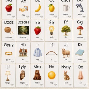 May include: A set of flashcards featuring the Hungarian alphabet. Each card displays a letter, a corresponding image, and the Hungarian word. Images include a red apple, a banana, a strawberry, and a bear.