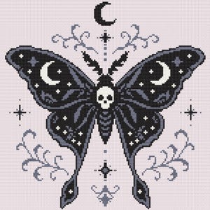 May include: A cross-stitch pattern featuring a large moth with black and grey wings, a central skull motif, and crescent moon accents. The design includes small stars, decorative swirling branches, and a crescent moon symbol above the moth.