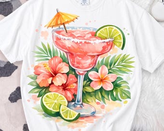 May include: White t-shirt featuring a watercolor illustration of a margarita cocktail with a lime wedge, orange umbrella, and tropical flowers. The design includes hibiscus and plumeria flowers, and green palm leaves.