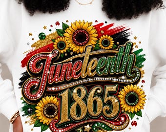 May include: White sweatshirt with a colorful Juneteenth graphic. The design features the word "Juneteenth" in red and green, the year "1865" in gold, and sunflowers. The design is embellished with rhinestones and glitter.