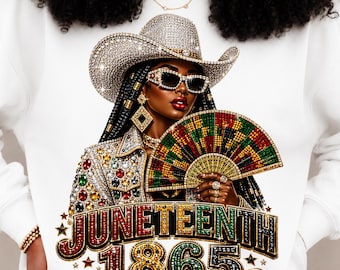 May include: White sweatshirt featuring a detailed illustration of a woman wearing a rhinestone-studded cowboy hat, sunglasses, and a jeweled jacket. The image includes a fan and the text "JUNETEENTH 1865" in a decorative font.