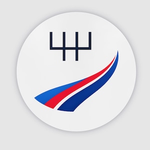 May include: A circular white sticker featuring a dark blue gear shift pattern icon at the top. Below the icon, a curved graphic element consists of three sweeping stripes in blue, red, and dark blue, creating a dynamic sense of motion.