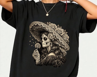 Camiseta de La Catrina soplando deseos con diente de león, regalo artístico del Día de Muertos, camiseta con estampado floral de esqueleto.