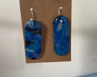 Pendientes de losa con piedra azul en espiral