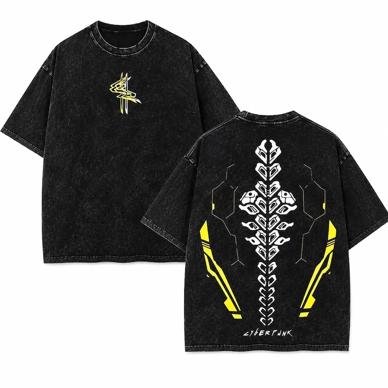 May include: Black t-shirt with a yellow and white graphic design. The front features a yellow abstract design, while the back displays a white and yellow skeletal design with the text "CYBERPUNK". The shirt has a washed, vintage look.