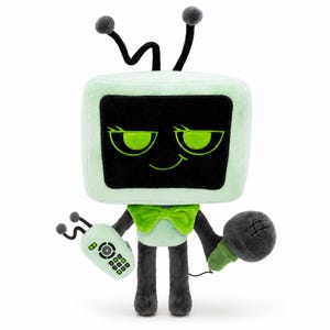 May include: A soft toy resembling a vintage television set, featuring a black screen and green trim. It has a green bow tie, a remote control, and a microphone. The toy's main colours are green, black, and grey.