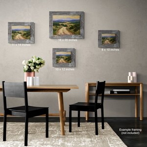 May include: Four framed landscape paintings with grey distressed frames are displayed on a neutral wall. The paintings vary in size: 20 x 25 cm, 25 x 30 cm, 28 x 36 cm, and 41 x 51 cm. The artwork depicts a dirt road winding through a valley.
