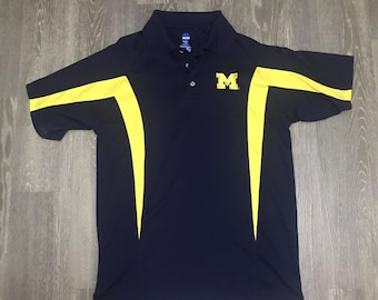 Polo de los Wolverines de la Universidad de Michigan, NCAA, talla pequeña para hombre, azul y amarillo.