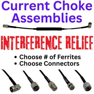 May include: A black coaxial cable assembly with a central ferrite bead, featuring text that reads Current Choke Assemblies, INTERFERENCE RELIEF, Choose # of Ferrites, and Choose Connectors, alongside five distinct metal connector types.