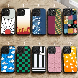 May include: A collection of ten phone cases with various designs. The cases feature patterns such as waves, flames, geometric shapes, and anime-inspired graphics. Each case has a black border and is designed for a smartphone.
