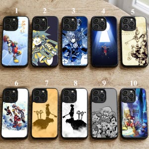 May include: Ten phone cases with designs inspired by the video game Kingdom Hearts. The cases display character illustrations, keyblades, and iconic imagery in various colours and artistic styles. Each case has a black border.