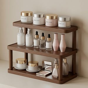 May include: A two-tiered dark wood storage shelf holding various skincare and cosmetic products. The top shelf features four cylindrical jars with metallic lids. The bottom shelf contains two pump bottles, three dropper bottles, two conical bottles, two jars on saucers, a compact mirror, and two additional bottles.
