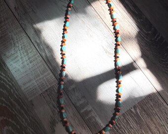 Turquoise and orange spiney