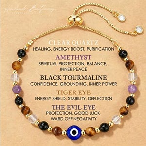 May include: A gold-tone adjustable bracelet featuring a central blue evil eye bead, interspersed with clear quartz, amethyst, black tourmaline, and tiger eye beads. The text lists the stones and their properties, including Clear Quartz, Amethyst, Black Tourmaline, Tiger Eye, and The Evil Eye.