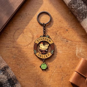 Stardew Valley Inspired Spinning Road Sign Metal Keychain Junimo Fan Gift for Video Gamers