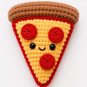 May include: A triangular crochet pizza slice plushie featuring a brown crust, red sauce, and yellow cheese. The slice has three round red pepperoni toppings and a stitched face with two black plastic safety eyes and a small black embroidered smile.