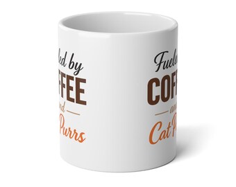 May include: White ceramic coffee mug with the text "Fueled by Coffee and Cat Purrs" in black, brown, and orange lettering. The mug is cylindrical and has a glossy finish. A perfect gift for cat lovers and coffee enthusiasts.