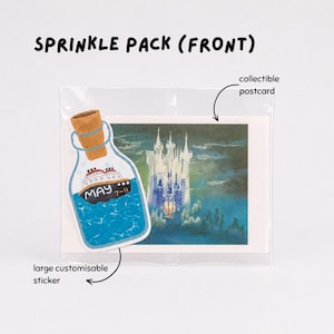 May include: A clear plastic package labeled SPRINKLE PACK (FRONT) containing a collectible postcard featuring a white castle against a dark blue background and a large customisable sticker shaped like a bottle with a ship and the text MAY 7-11.