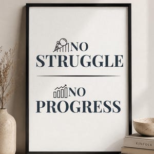 May include: A framed wall art print featuring the black text NO STRUGGLE NO PROGRESS on a white background. The design includes a graphic of a person pushing a circular object up a bar chart and a separate graphic of an upward trending bar chart.