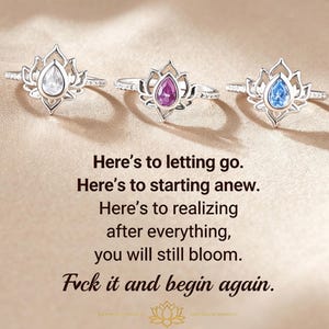 Puede incluir: Tres anillos de plata con un engaste en forma de loto y una piedra en forma de pera en transparente, rosa y azul. El texto dice: Here's to letting go. Here's to starting anew. Here's to realizing after everything, you will still bloom. Fvck it and begin again.