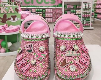 Custom Crocs Clogs design with Pink & Green Rhinestones Jibbitz Size 9 AI Background