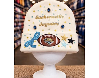 Jacksonville Jaguars Beanie Cream design with teal and gold rhinestones, Logo