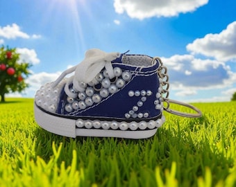 Design personalizzato per portachiavi con sfondo a perle in intelligenza artificiale