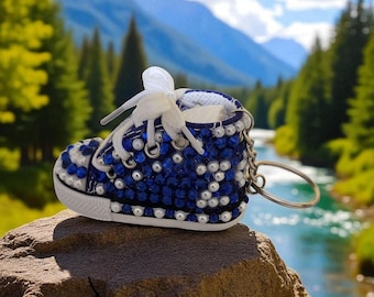 Custom Keychain blue design with rhinestones and pearls AI background