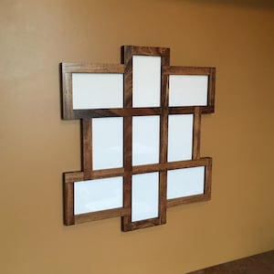 Collage frame made from poplar wood that will hold 9 4x6 pictures.