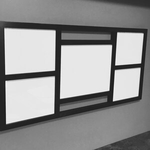 May include: A black picture frame with five openings for photos. The frame has a modern design with a thin black border and a white mat.