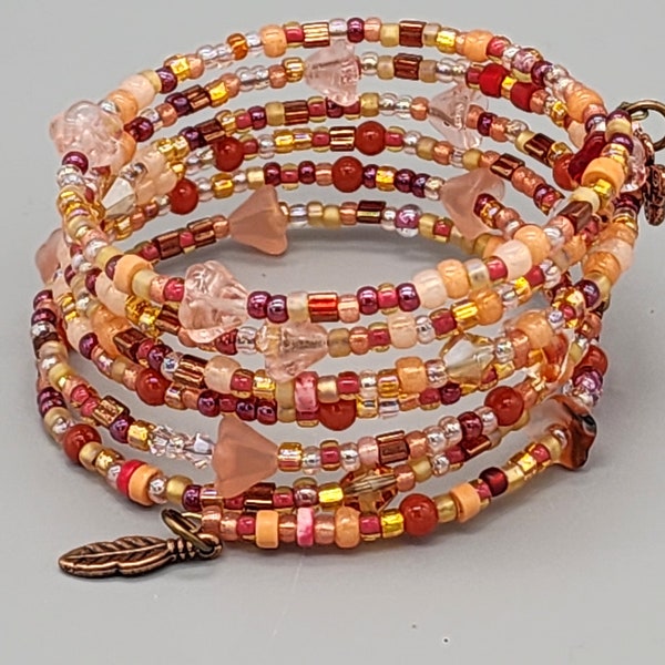 6 wraps beaded memory wire bracelet in peach, pink, raspberry red colors. Seed beads multi-wrap bracelet. Bohemian bangle. Gypsy bracelet.