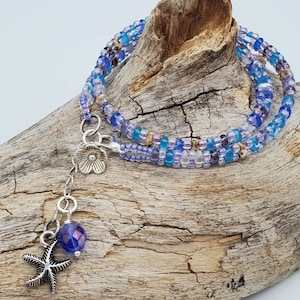 Double wrap blue, purple, white superduo bracelet. Boho chic seed beads bracelet. Beaded button clasp band. violet, lilac, blue bracelet.