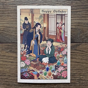 May include: A rectangular greeting card featuring an illustration of people in traditional East Asian attire inside a room with the text Happy Birthday at the top. The scene includes colourful flowers, various glass bottles, and wooden boxes.