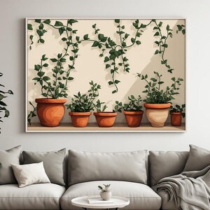 Peut inclure: Une impression d'art mural encadrée représentant six pots en terre cuite de tailles variées alignés sur une étagère. Chaque pot contient une plante verte feuillue avec des vignes s'étendant vers le haut sur un fond de mur crème clair.