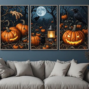 May include: A triptych wall art set featuring a dark forest scene with glowing jack-o'-lanterns, a full moon, a black cat, a raven, and a skeletal hand reaching from bare branches. The three framed prints display a cohesive Halloween theme.