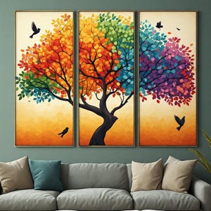 Peut inclure: Un ensemble de trois tableaux muraux représentant un arbre stylisé aux feuilles multicolores vives dans des tons orange, jaune, vert, bleu et violet. Des silhouettes noires d'oiseaux sont représentées en vol sur les trois panneaux verticaux.