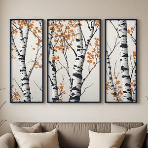 Peut inclure: Un ensemble de trois cadres muraux verticaux rectangulaires à bordure sombre. Chaque cadre présente une illustration détaillée de troncs de bouleaux blancs avec des marques horizontales noires et des feuilles d'automne orange vif.