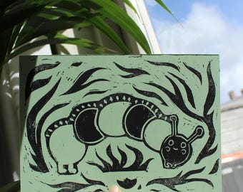 Handgemaakte linoprint - rups